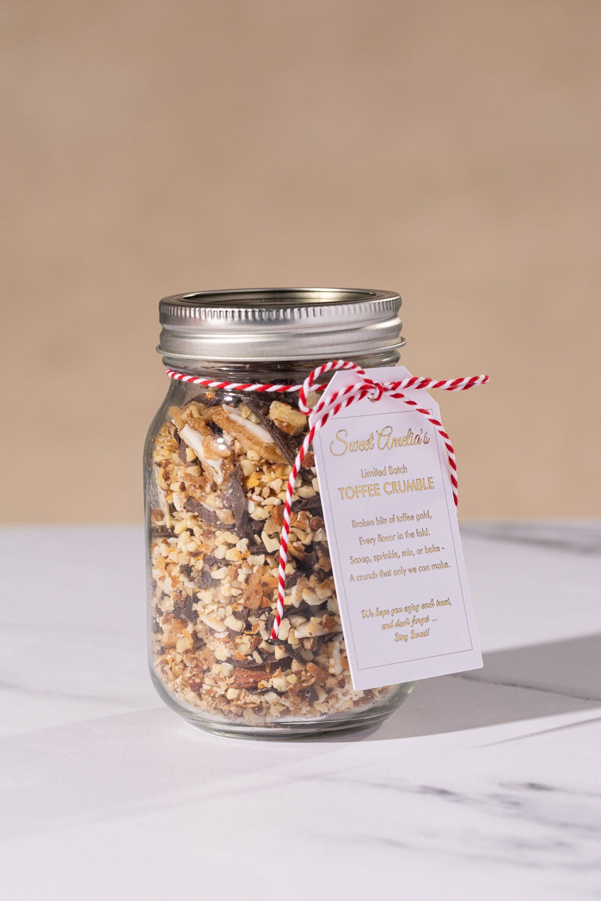 Small glass jar of Sweet Amelia's toffee crumble